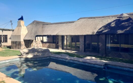 Spacious Renovated Three- Bedroom Family Home with two Bachelor Flats, an Entertainment Area and Pool on a large 1,655m² stand