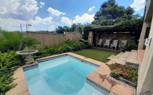 Stylish Double Storey Three-Bedroom Home with Pool and Scenic Views in Exclusive Jordaan Park