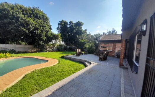 FOUR-BEDROOM FAMILY HOME WITH POOL AND ENTERTAINMENT AREA