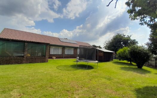 Low-Maintenance Face Brick Three-Bedroom Home with Borehole and Solar Power on a large 1,190m² stand in Upper Rensburg