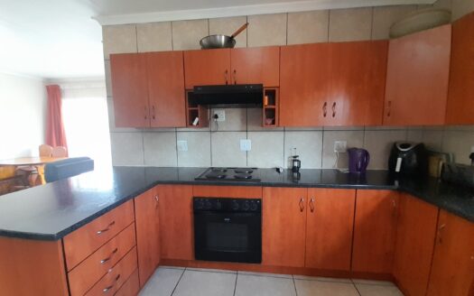 Modern, Secure & Perfectly Positioned – First Floor Sectional Title Apartment