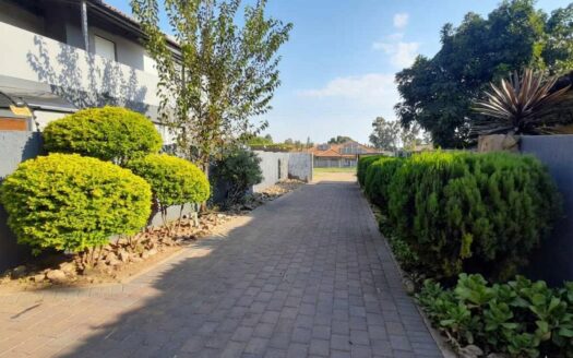 Three bedroom Family Home with Open Plan Living and Swimming Pool tucked away on a private panhandle