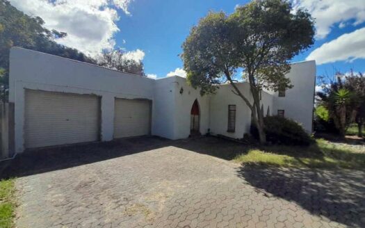 A unique three-bedroom family home for sale on large 1,190m² corner stand in the Upper Rensburg Area.